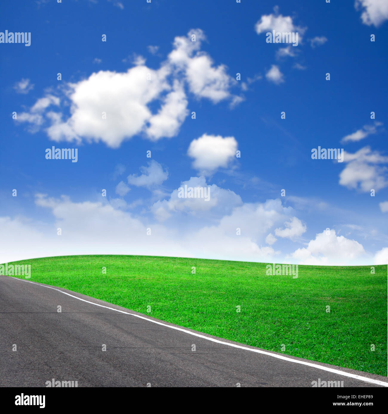 Road and green field Stock Photo - Alamy