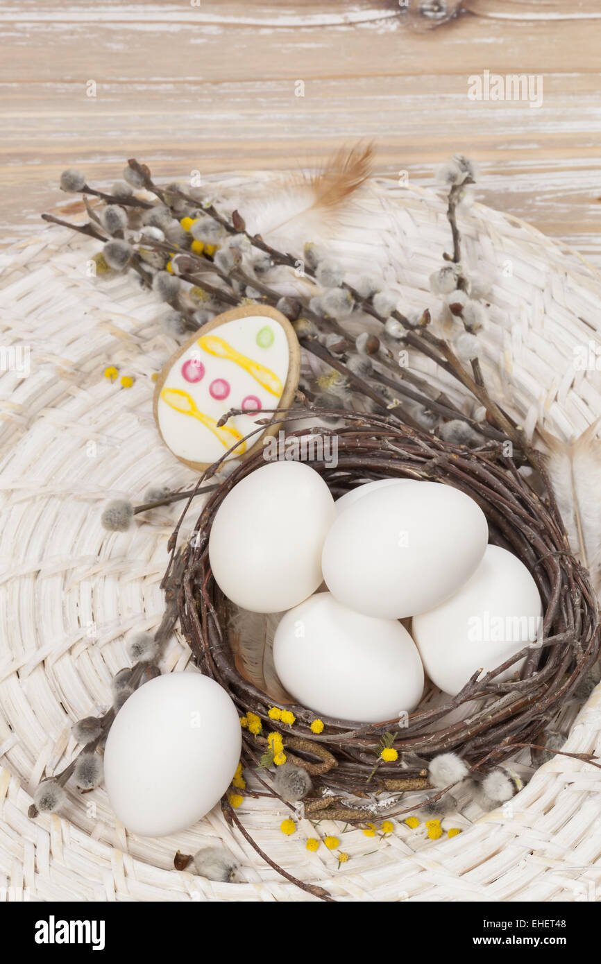 Easter eggs. Easter eggs in nest on the wooden table Stock Photo - Alamy