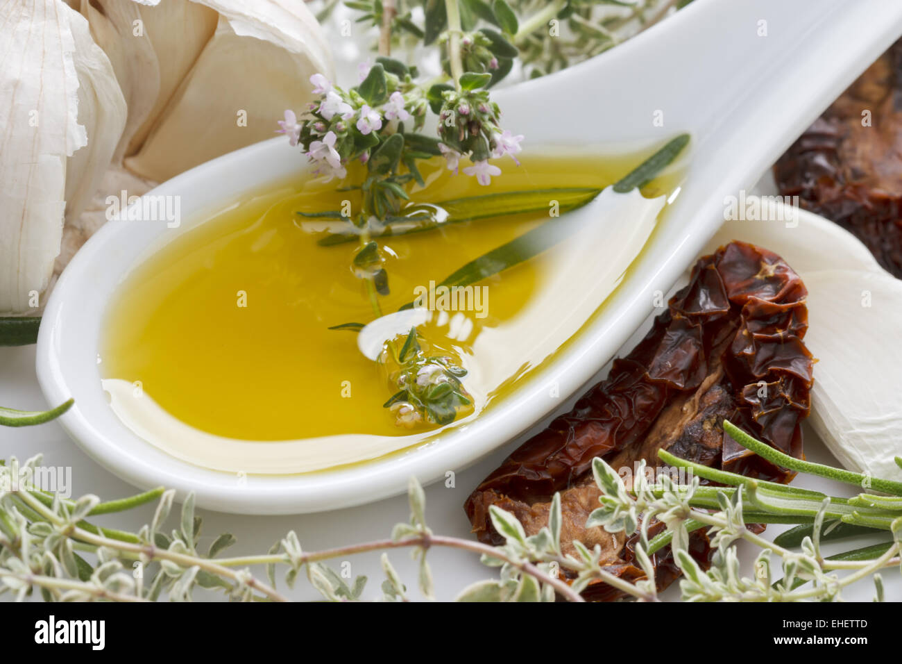 Olive Oil with Herbs Stock Photo