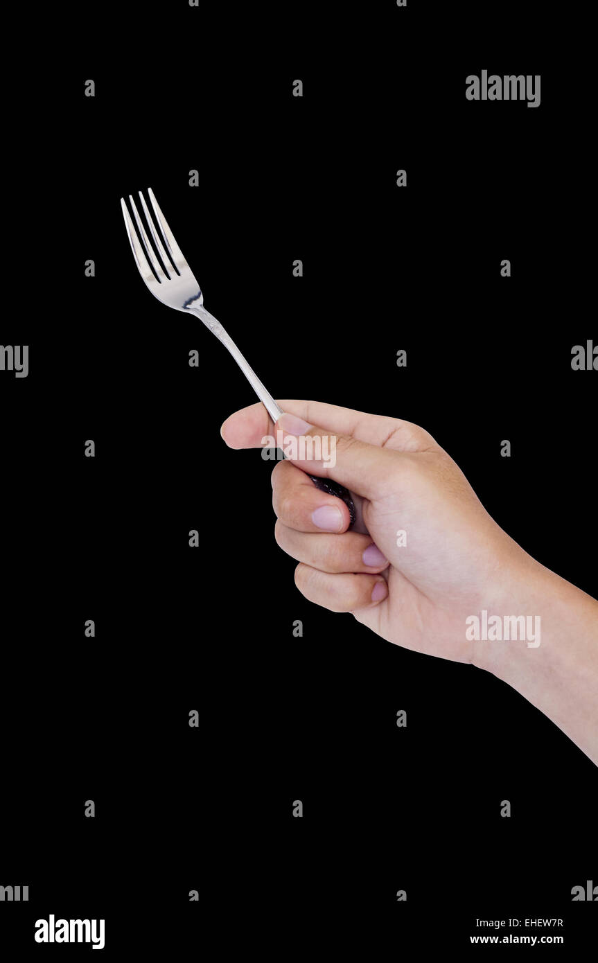 hand holding fork Stock Photo Alamy