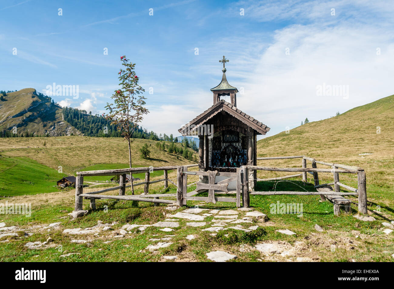 Wooden chapel in the alps Stock Photo