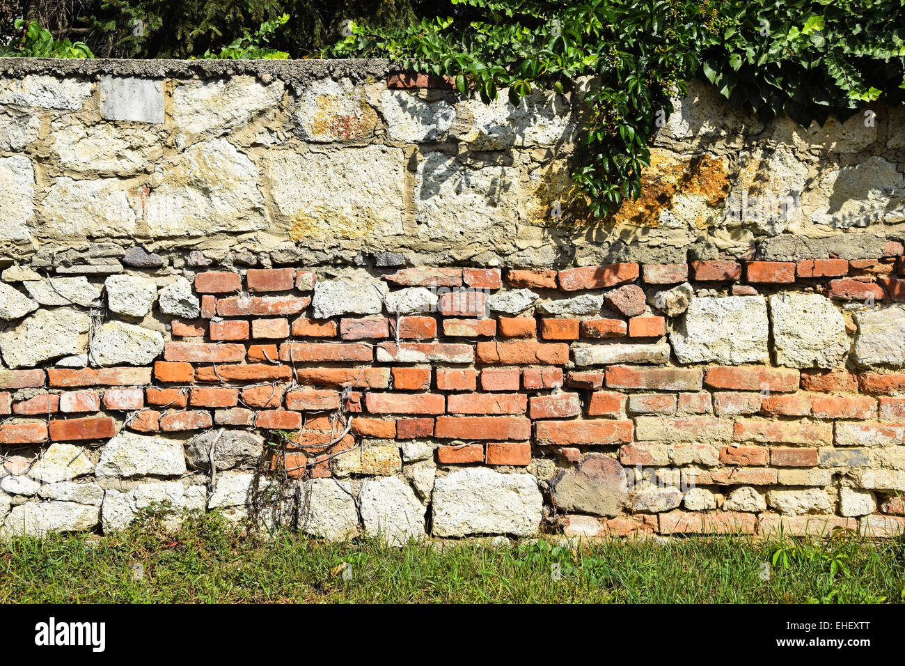 Old stone and brick wall Stock Photo