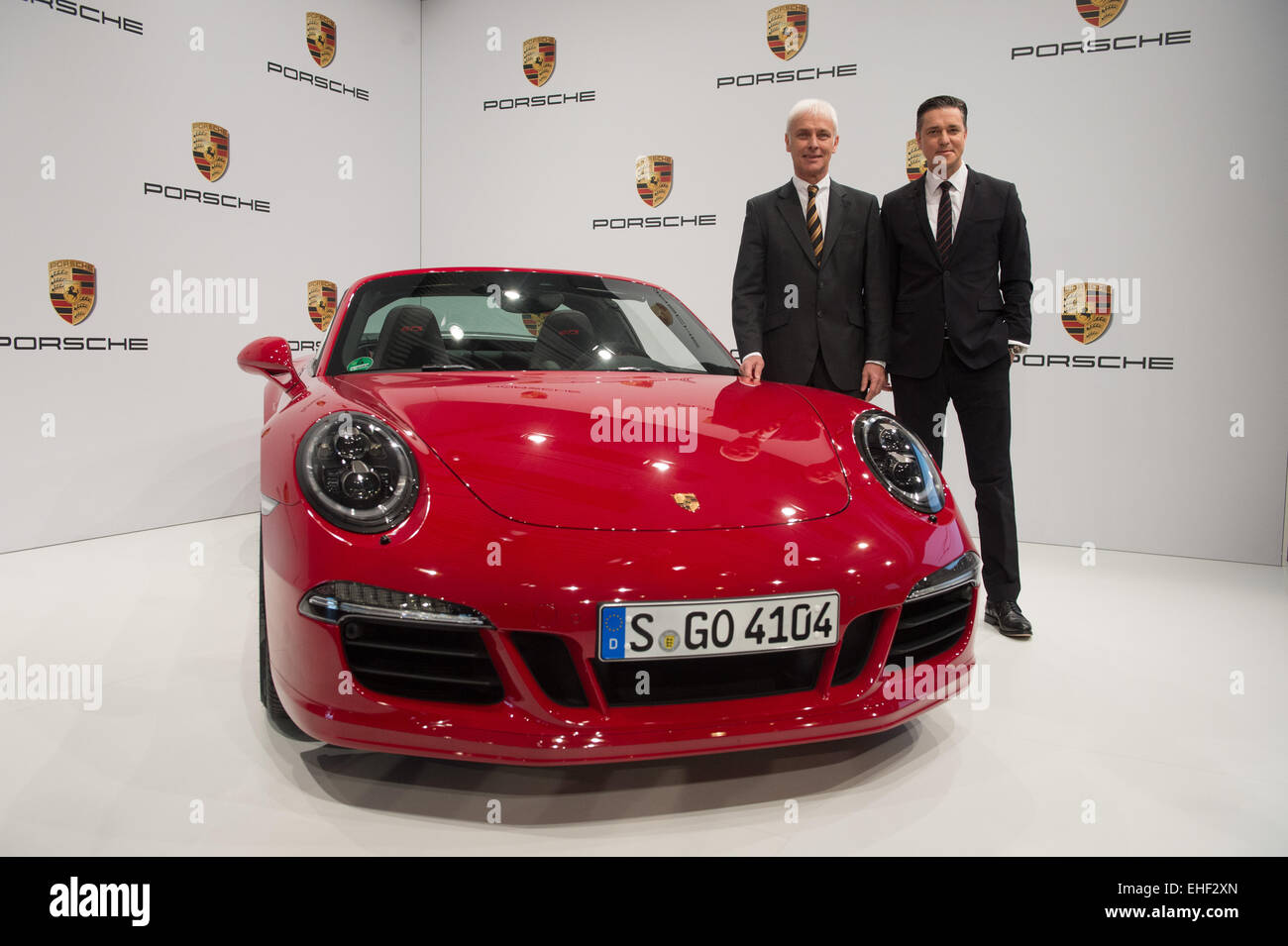 CEO of Porsche AG, Matthias Mueller (L), and chief financial officer