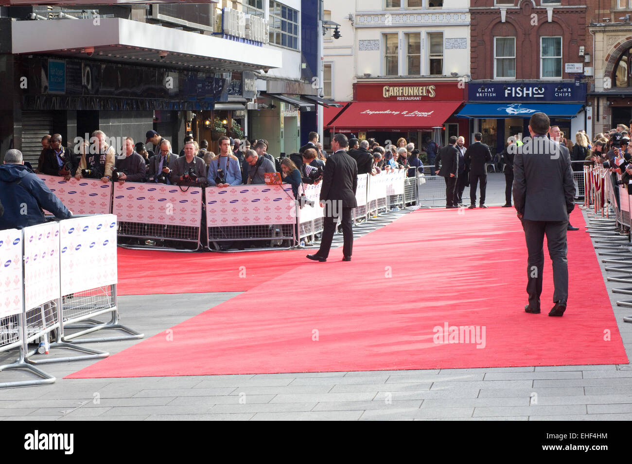 Photographers await the arrival of stars on the red carpet for the Princes Trust Event Stock Photo