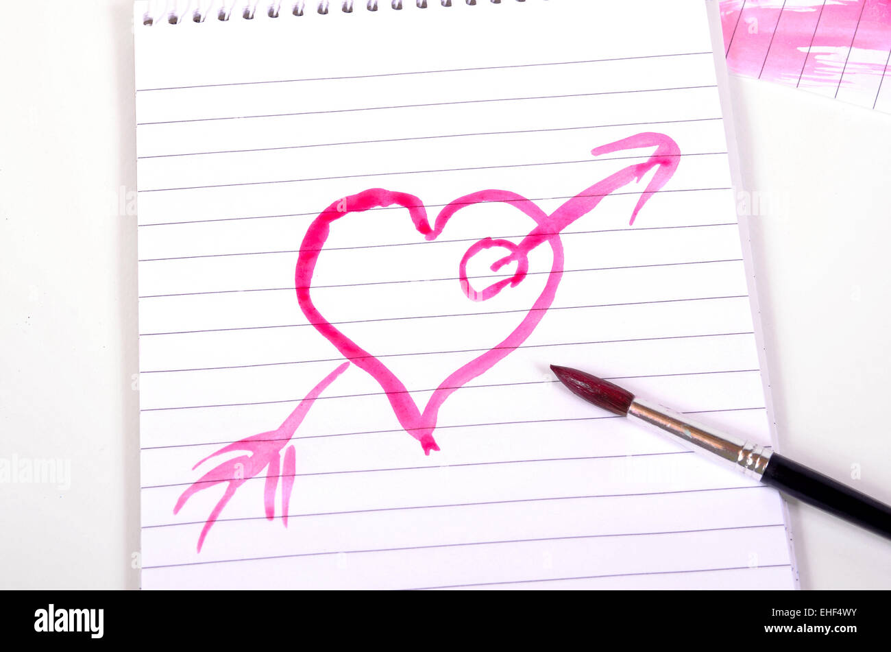 Paint brush drawing love hearts Stock Photo