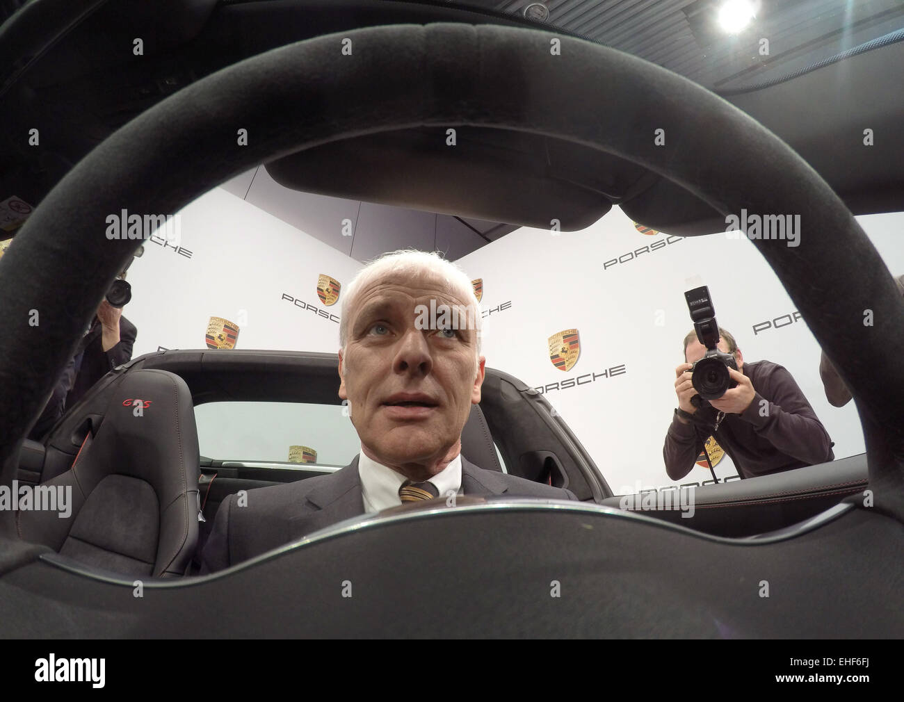 CEO of Porsche AG, Matthias Mueller, sits in a Porsche 911 Targa 4GTS