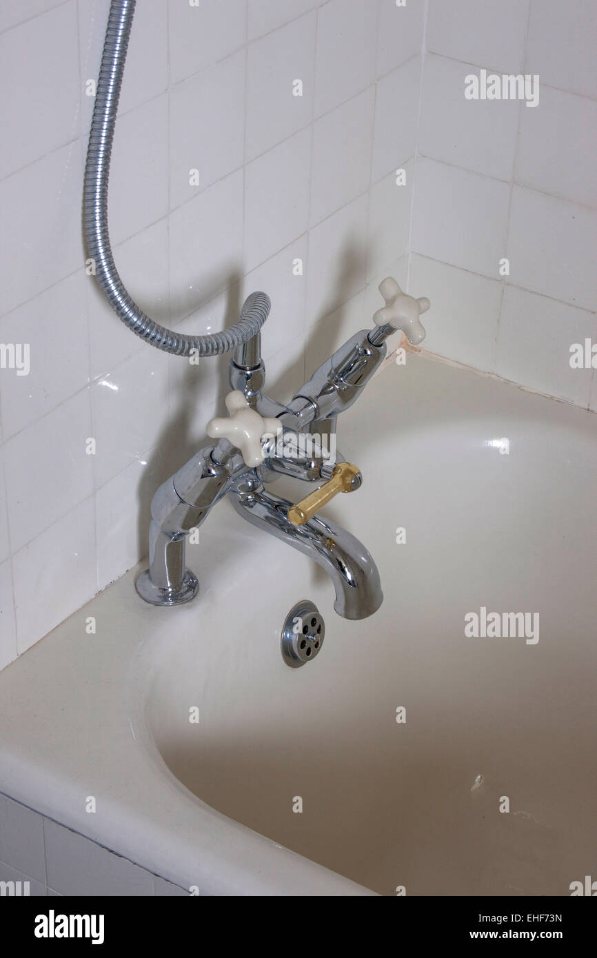 Mixer tap fitting over bath in apartment in Highpoint One, London Stock Photo