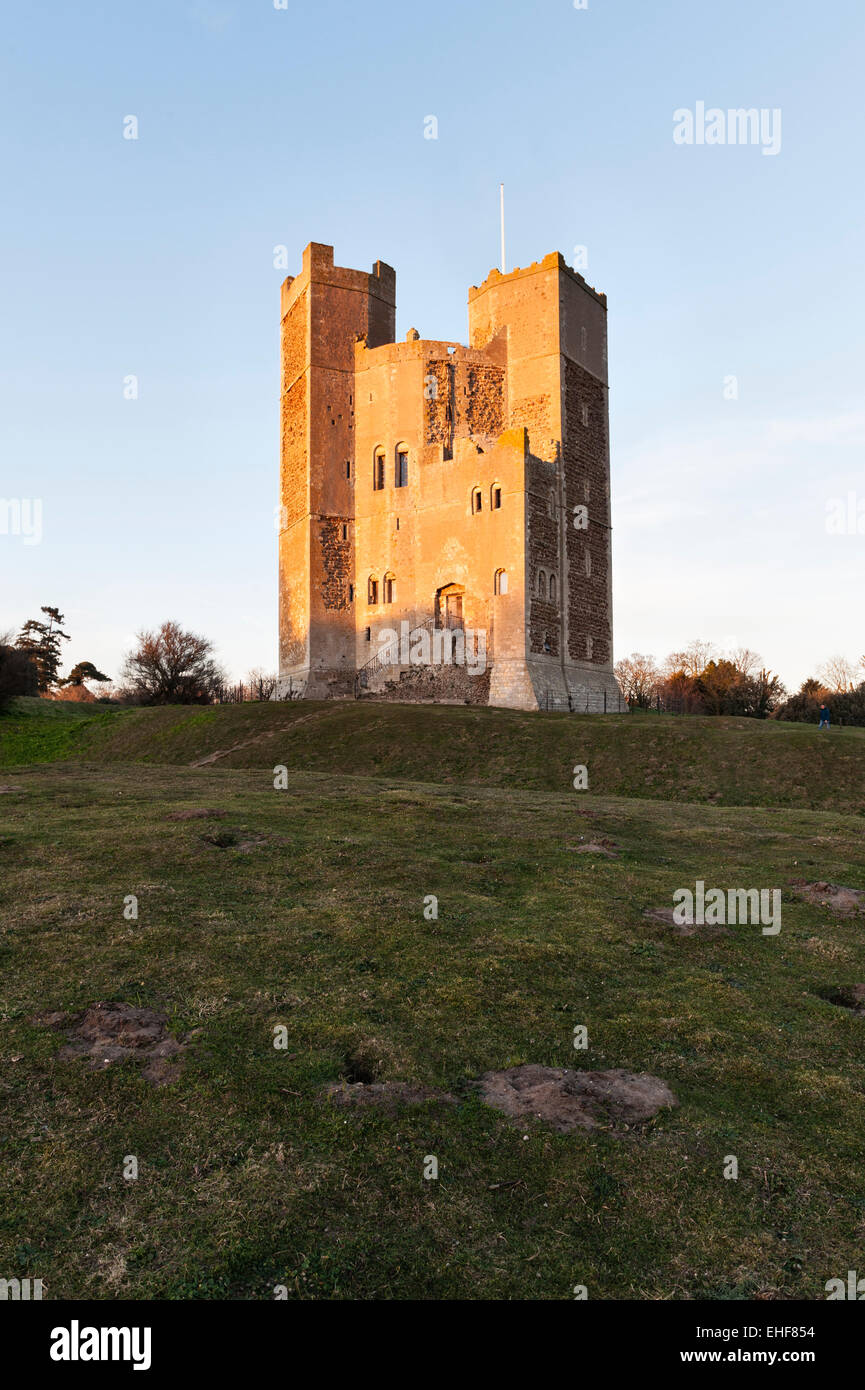 Orford Castle, Suffolk, UK, at sunset. Built about 1170, it looks over Orford Ness and out across the coast to the North Sea. Stock Photo