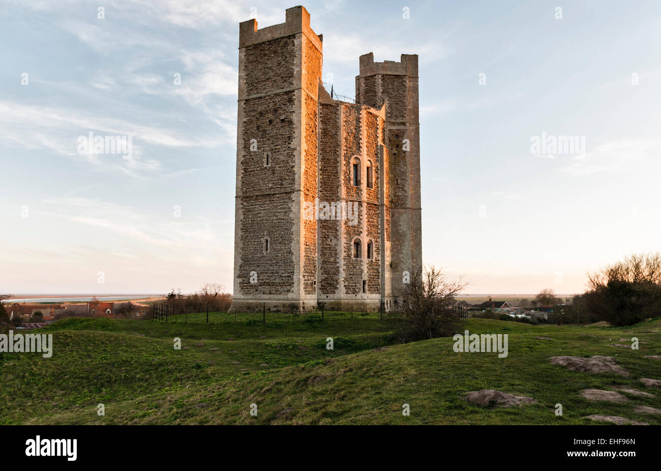 Orford Castle, Suffolk, UK, at sunset. Built about 1170, it looks over Orford Ness and out across the coast to the North Sea. Stock Photo