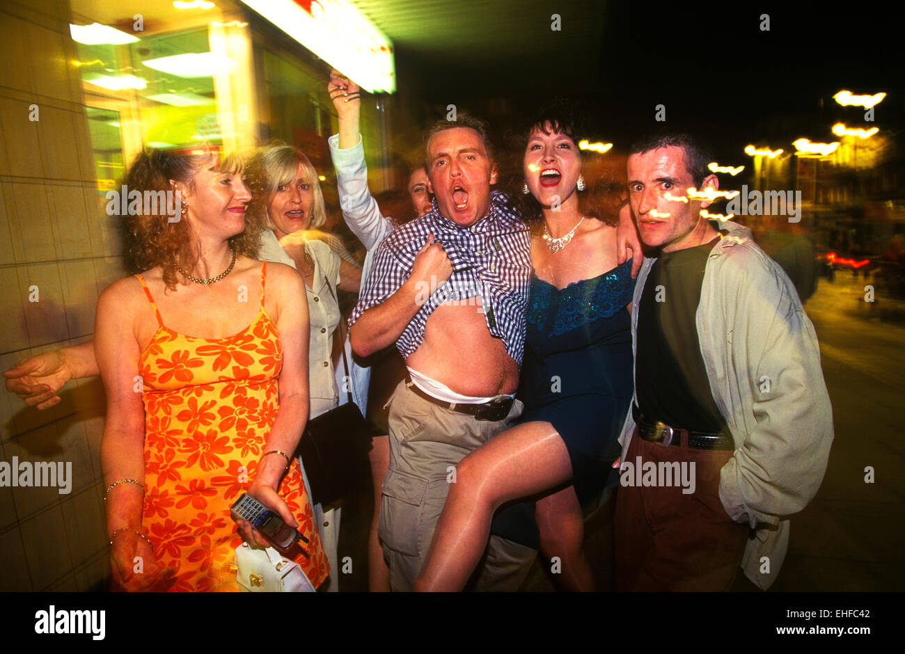 Group of friends on a night out on The Big Market in Newcastle. Stock Photo