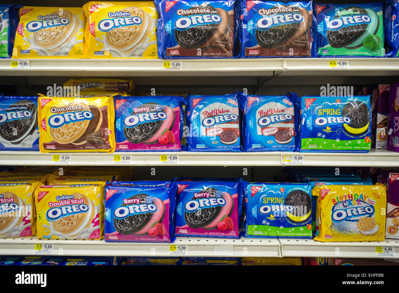 Boxes of Nabisco's Oreo Cookies in multiple yummy flavors on a supermarket shelf in New York on Tuesday, March 9, 2015. The company has upped the ante for cookie lovers by coming out with multiple flavors of the milk and cookie staple. Recent additions include 'Red Velvet' and 'Birthday Cake' with reports of cotton candy and peanut butter coming.  (© Richard B. Levine) Stock Photo