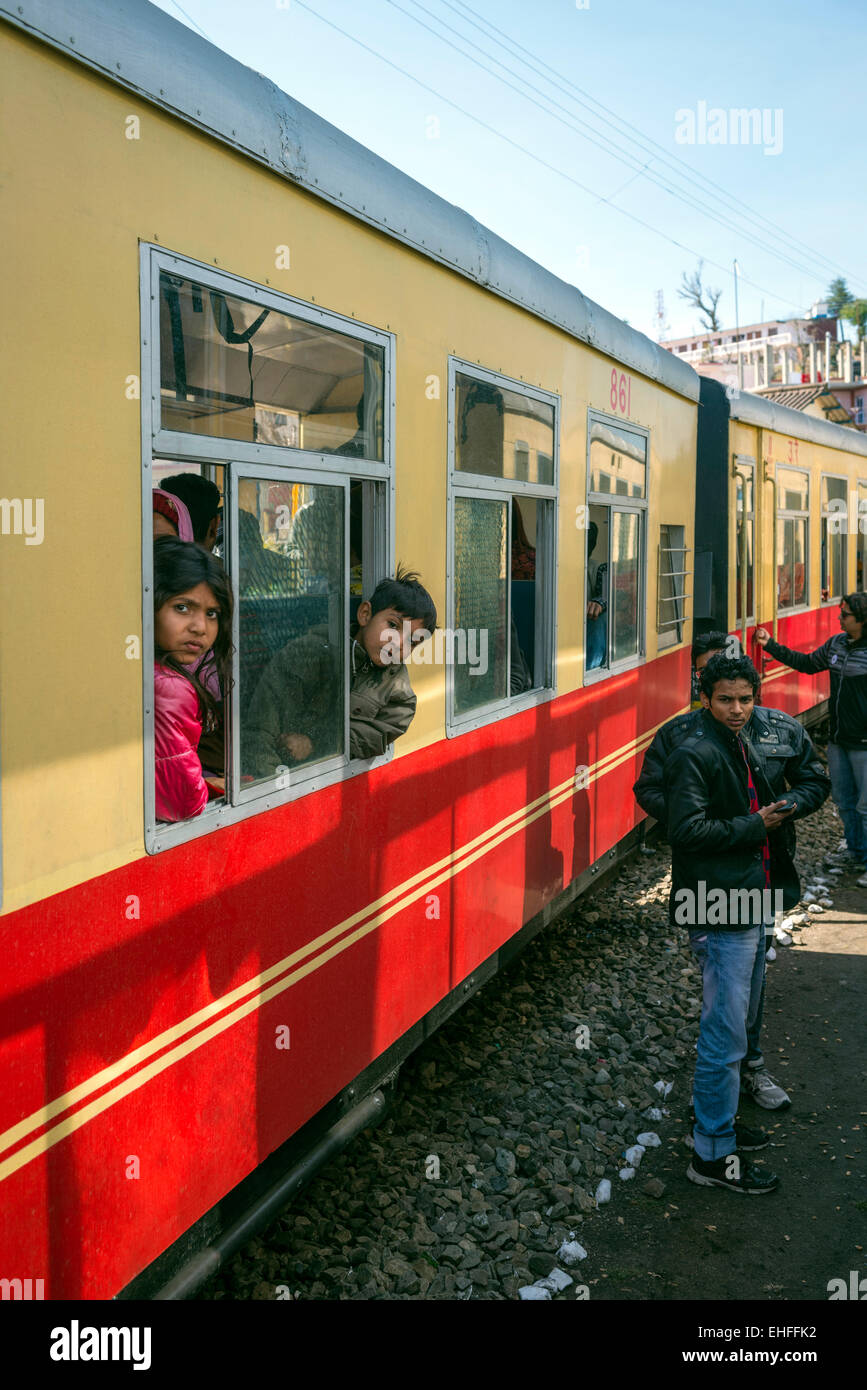 The narrow gauge Kalka-Shimla train winding down through the Himalayan foothills in India Stock Photo