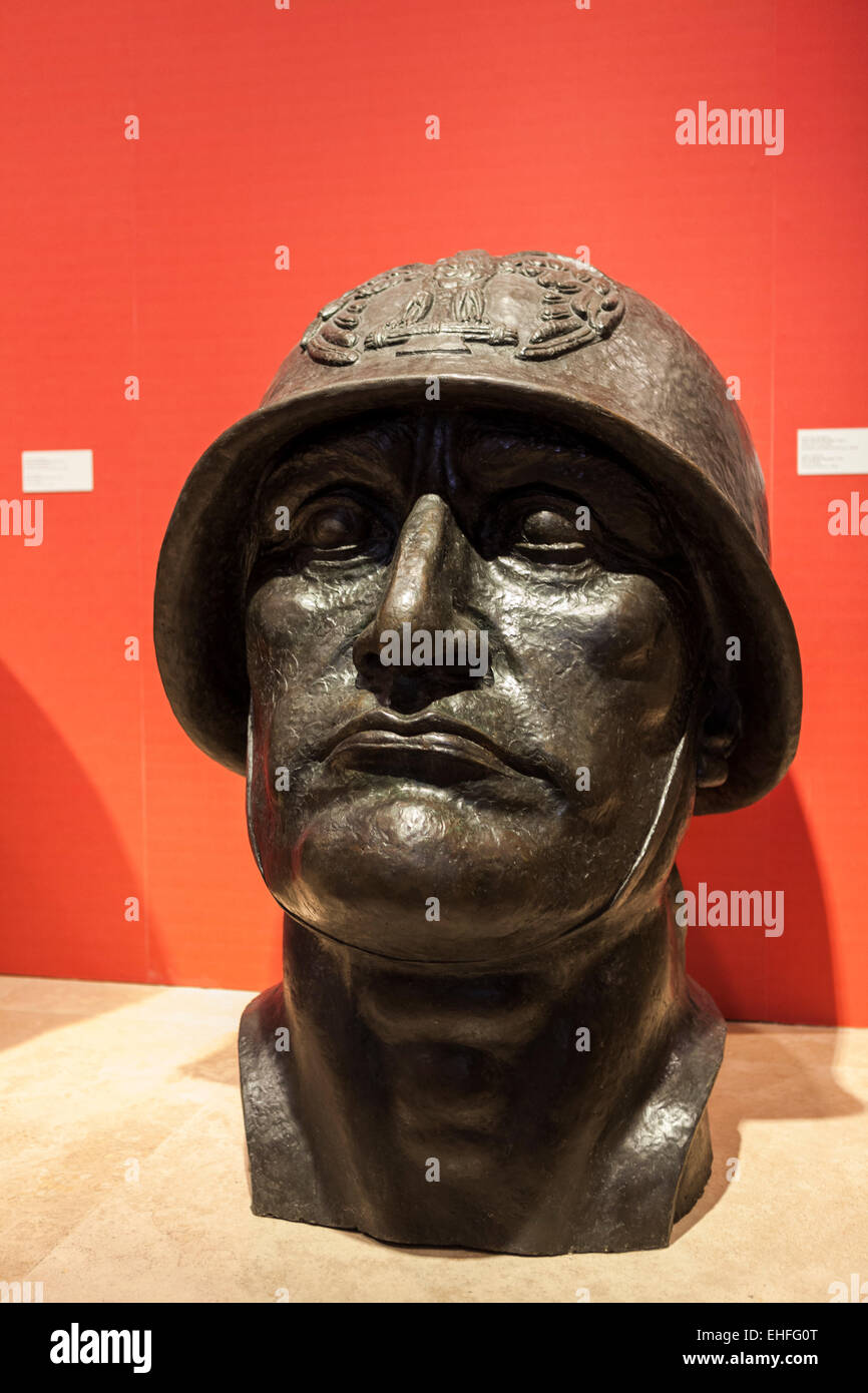 Bronze head of Benito Mussolini wearing fascist helmet Stock Photo