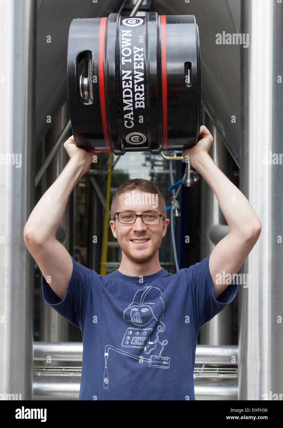 Staff Member Holding Beer Barrel at the Camden Town Brewery London
