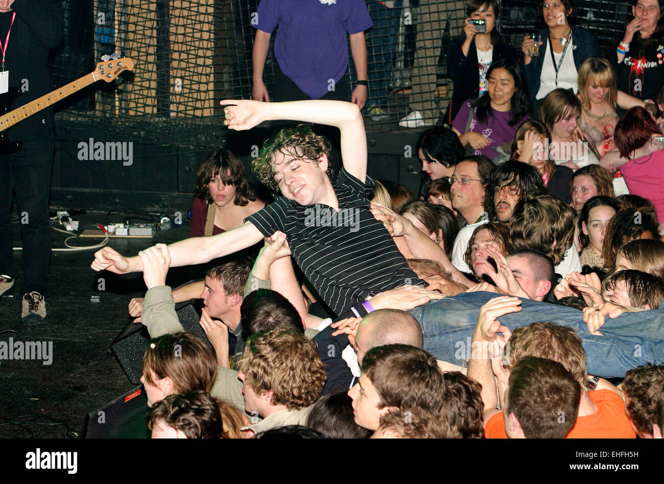 Lead singer from The Others crowd surfing at Club NME at Koko in Camden London. Stock Photo