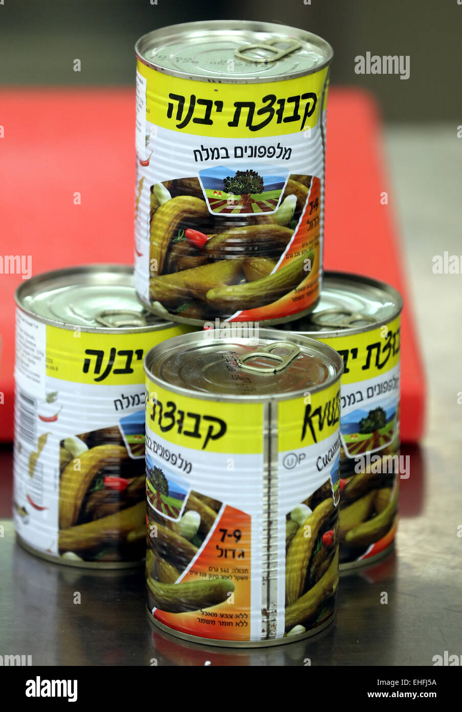 Berlin, Germany. 13th Mar, 2015. Cans of gherkins during a press conference before the demonstration of food preparation for the Chabad Jewish educational center Kosher Festival in the Hotel Interconti in Berlin, Germany, 13 March 2015. Photo: WOLFGANG KUMM/dpa/Alamy Live News Stock Photo