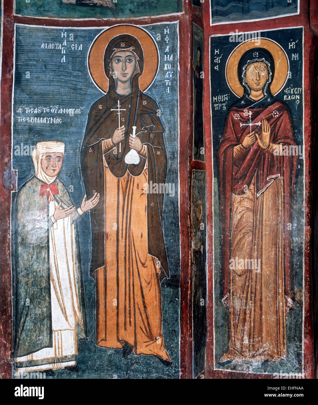 St Anastasia curer of poisons with supplicant, on right St Irene 12C-13C, Church of Our Lady of the Pastures, Asinou, Cyprus Stock Photo