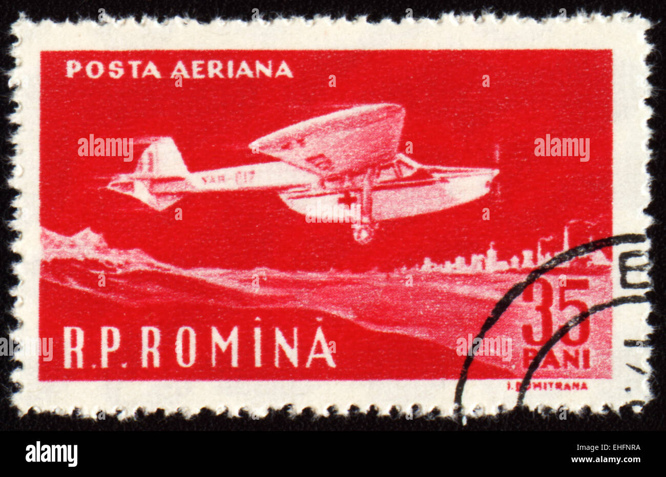 ROMANIA - CIRCA 1960: A stamp printed in Romania shows flying vintage ambulance plane Stock Photo