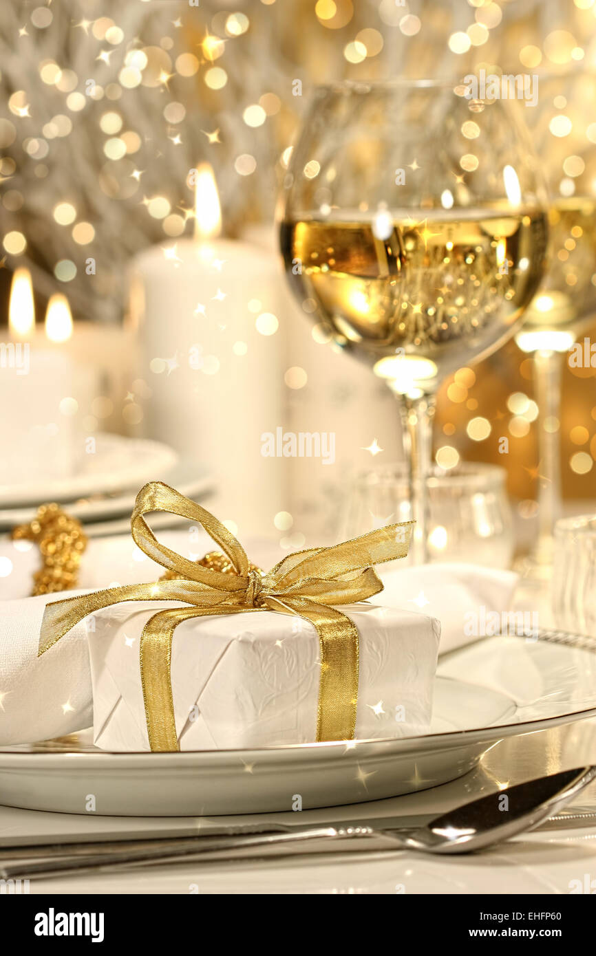 Gold ribbon gift with gold background Stock Photo - Alamy