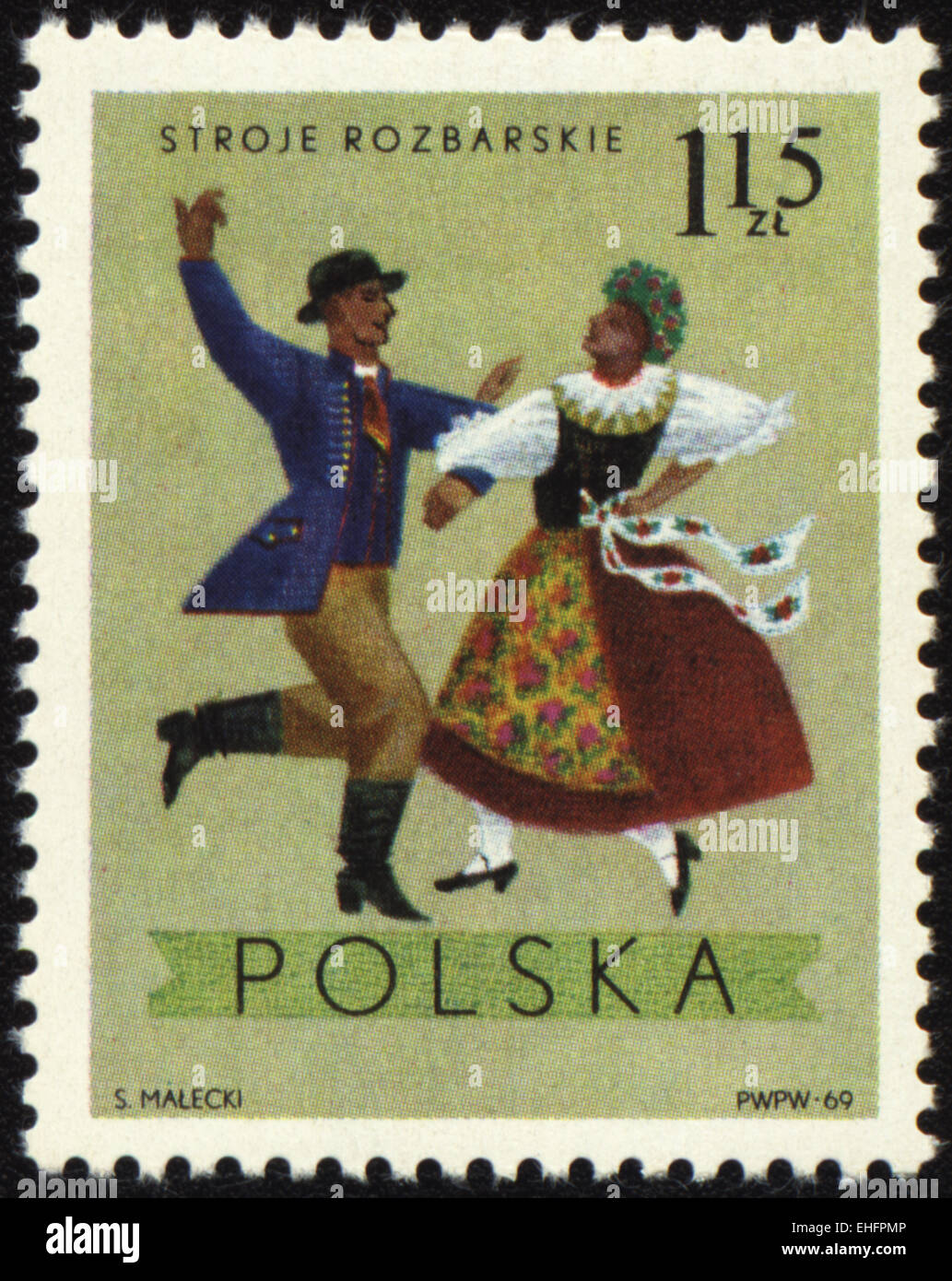POLAND - CIRCA 1969: A stamp printed in Poland shows polish folk dancers in costumes from Rozbarskie region Stock Photo