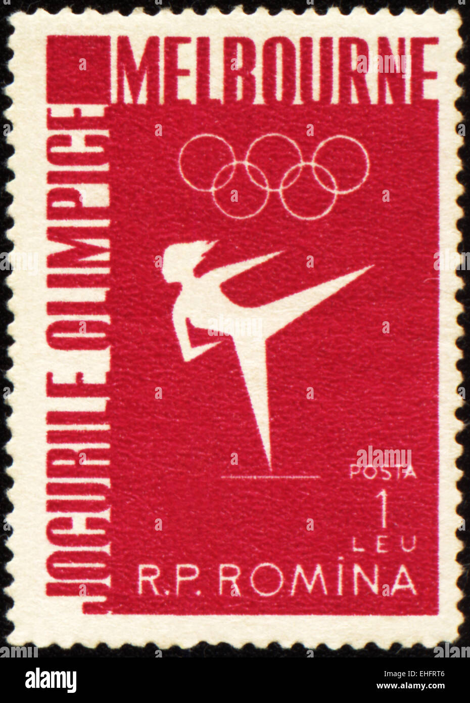 ROMANIA - CIRCA 1956: A post stamp printed in Romania shows gymnastics Stock Photo