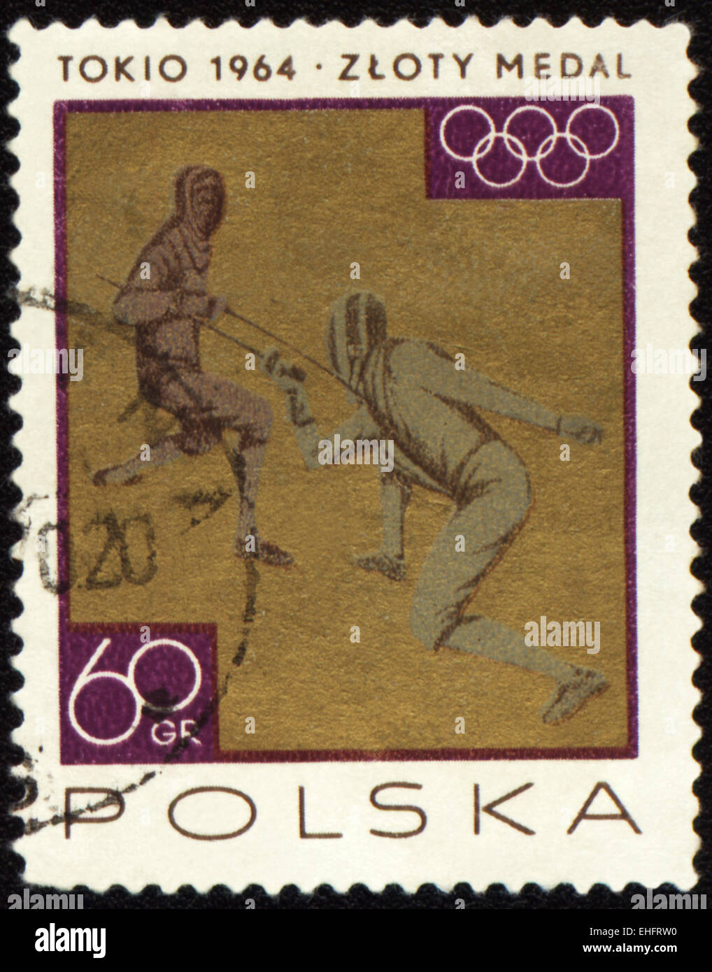POLAND - CIRCA 1964: A post stamp printed in Poland shows two fighting fencers Stock Photo
