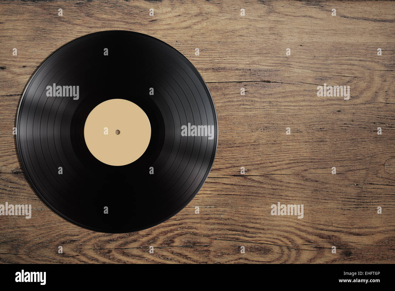 vynil record disc on wooden table Stock Photo