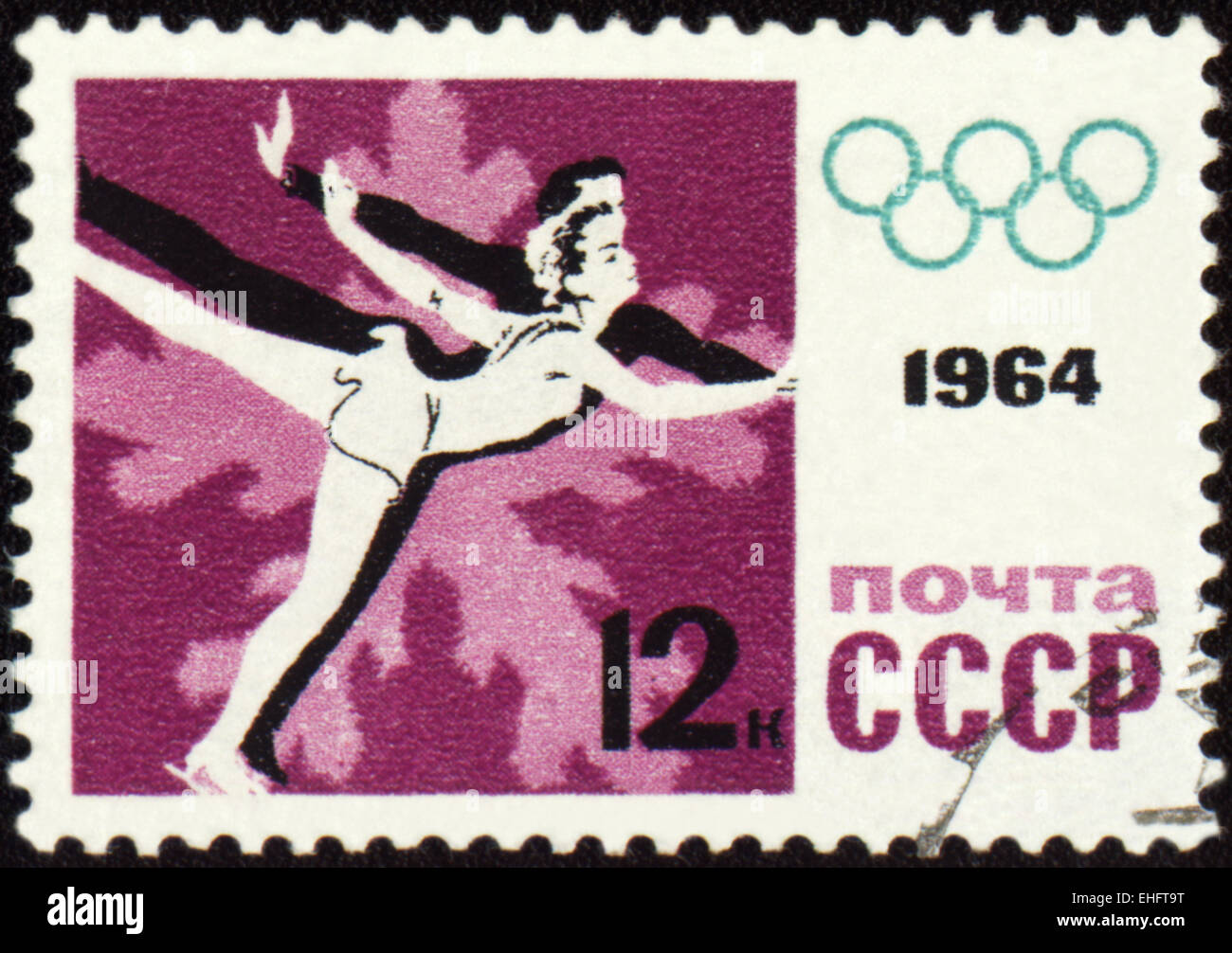 USSR - CIRCA 1964: A post stamp printed in USSR shows figure skaters Stock Photo