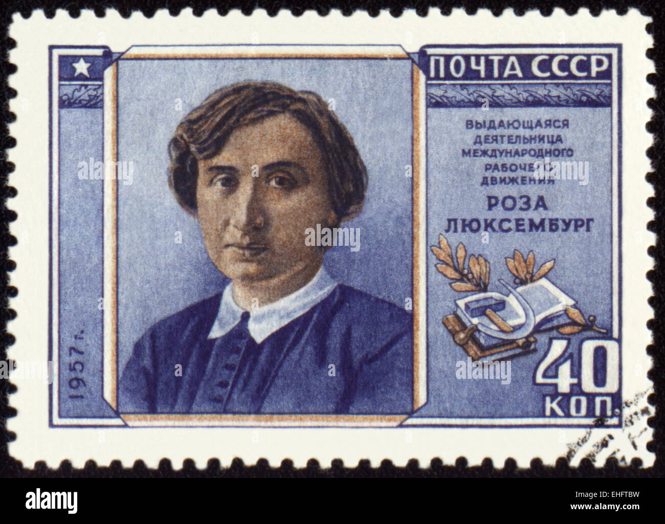 USSR - CIRCA 1957: A stamp printed in USSR shows portrait of Rosa Luxemburg Stock Photo