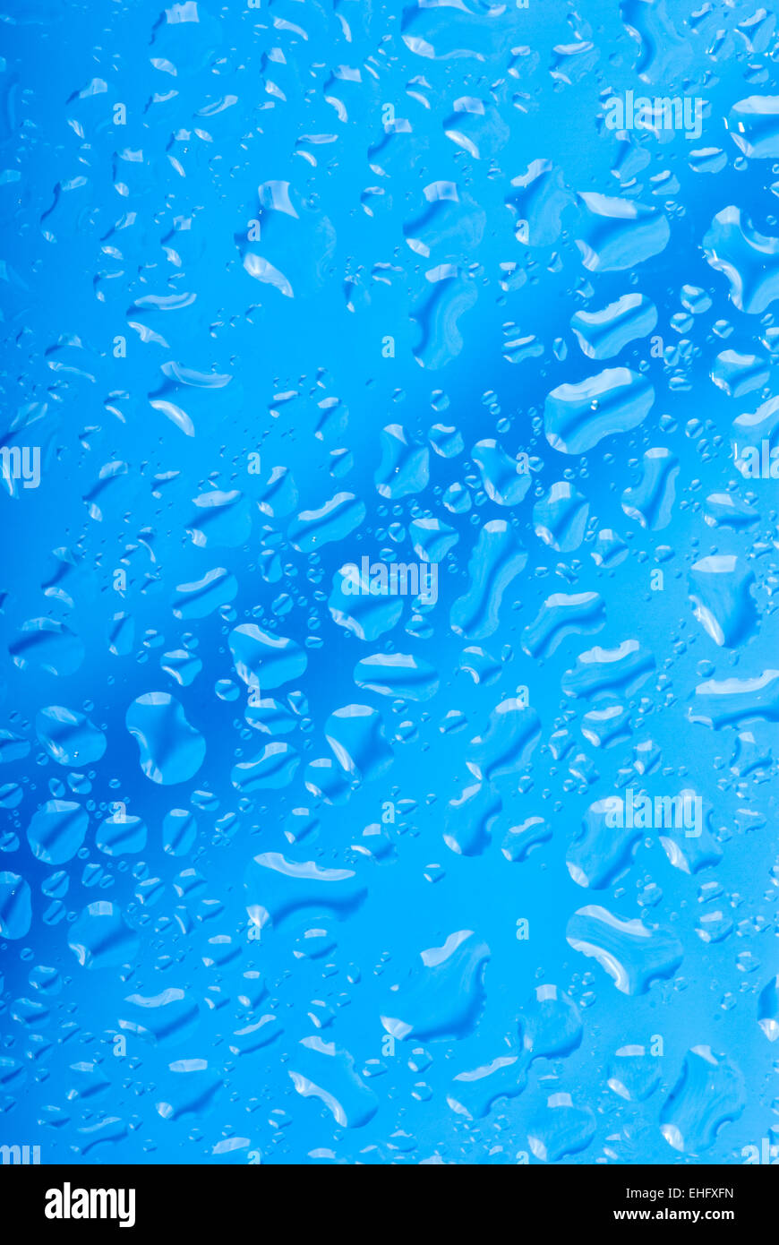Abstract blue water drops background Stock Photo - Alamy