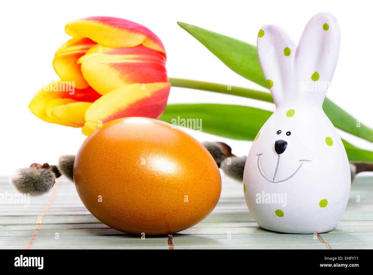 easter egg and rabbit with tulip flower in nest Stock Photo - Alamy