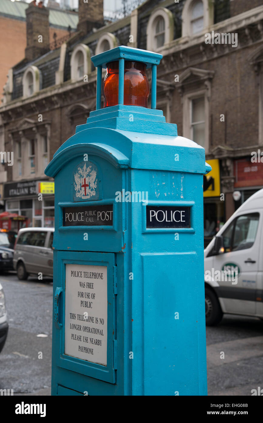Vintage blue Police phone post or box in central London outside Liverpool Street Railway Station, England - EDITORIAL USE ONLY Stock Photo