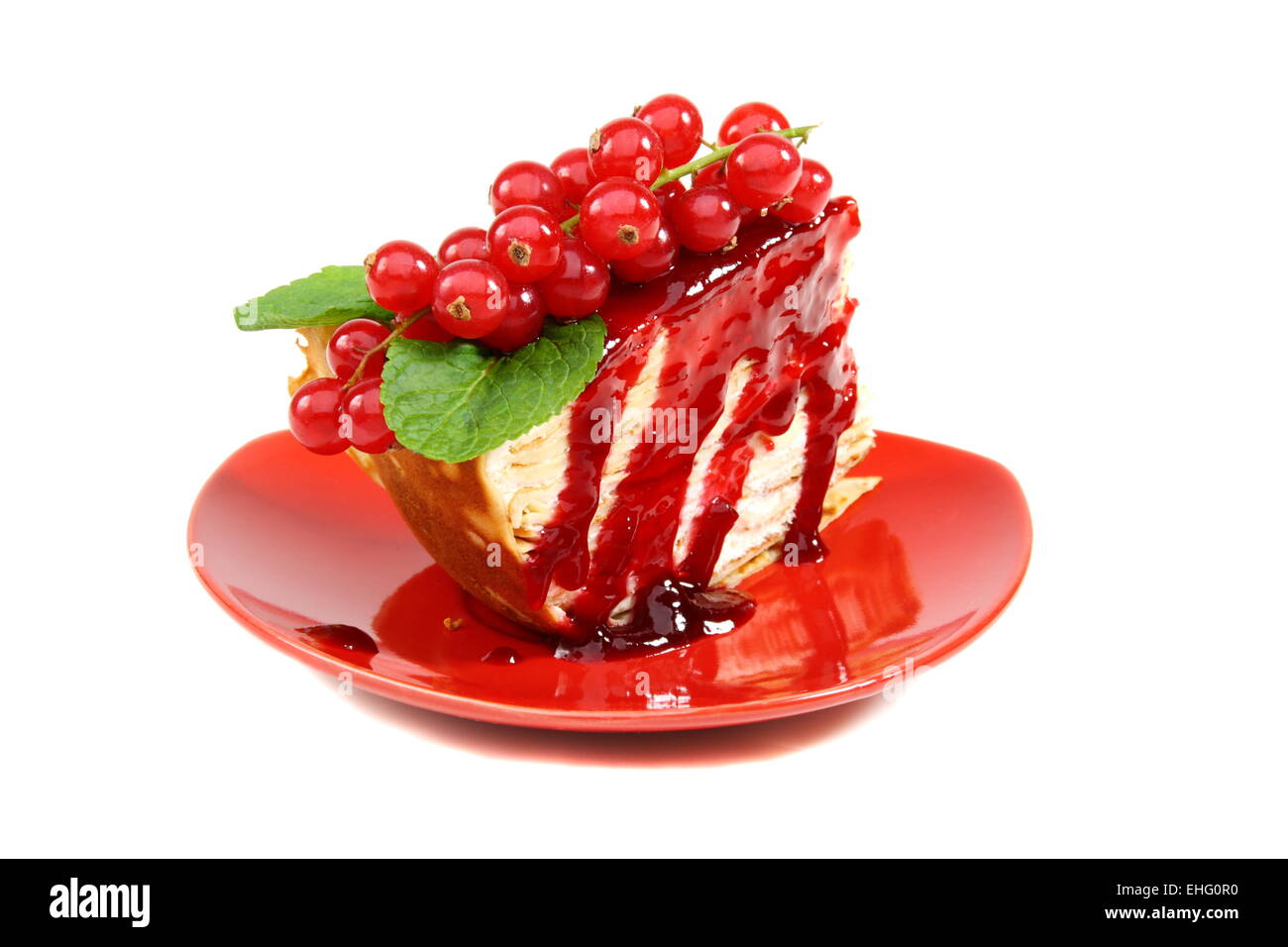 Crepe cake with berry sauce Stock Photo Alamy