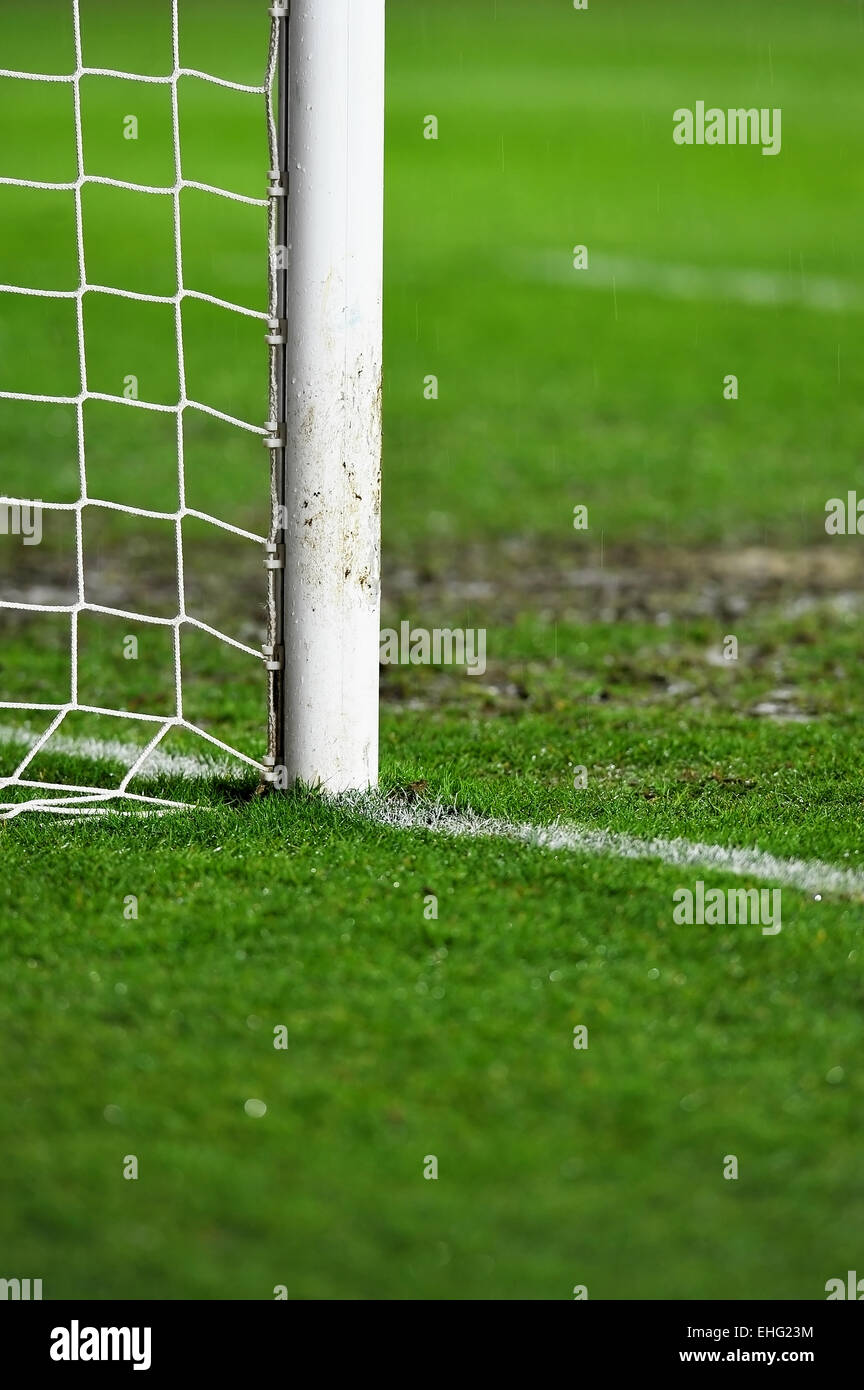 Sports shot with a soccer goal detail on rainy day Stock Photo