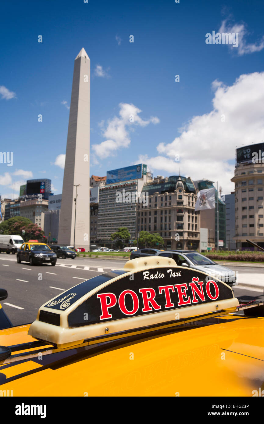 Argentina, Buenos Aires, Plaza de la Republica, Porteno radio taxi sign on top of cab Stock Photo