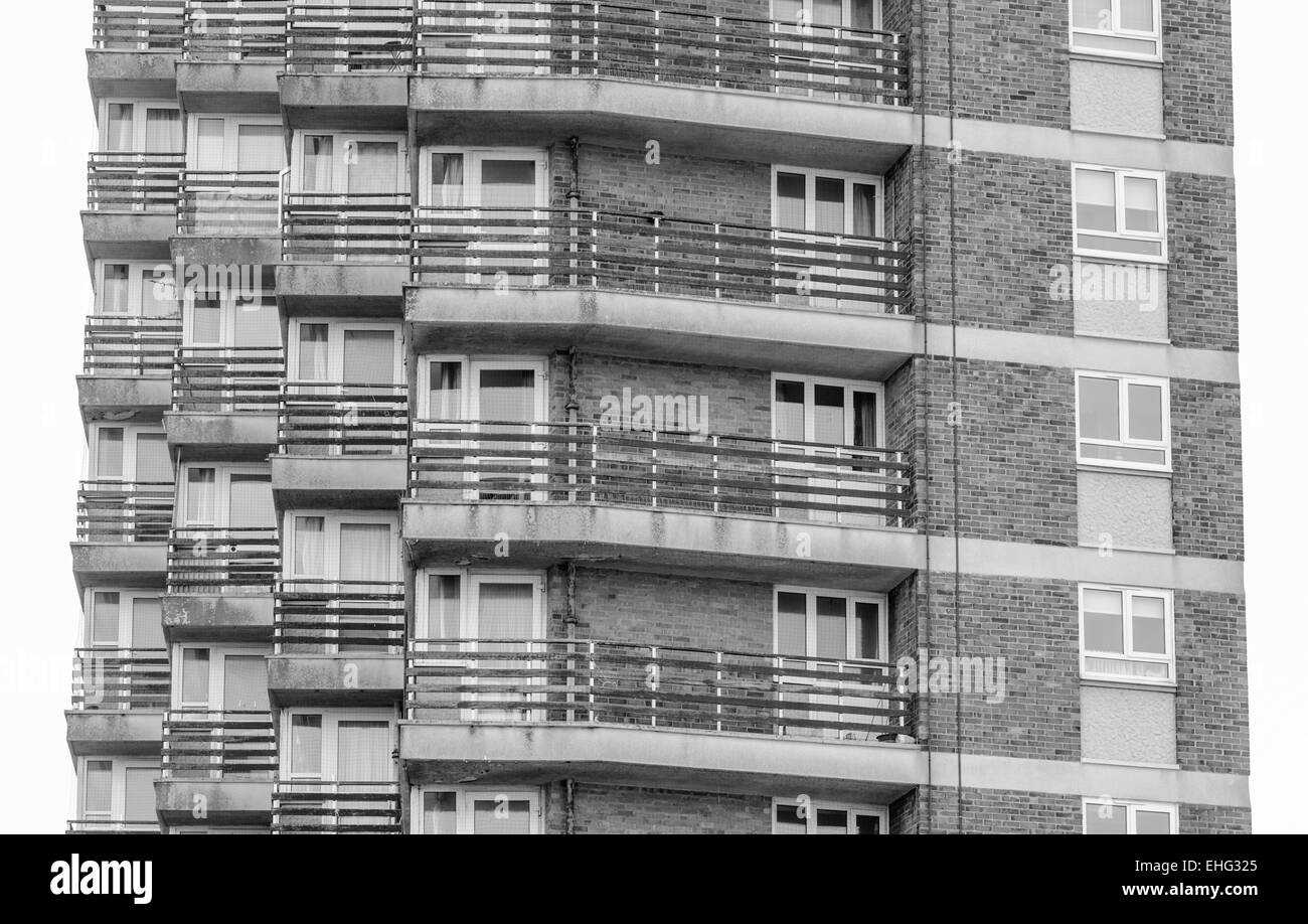 Tall residential block of flats in the UK, in black and white. Stock Photo