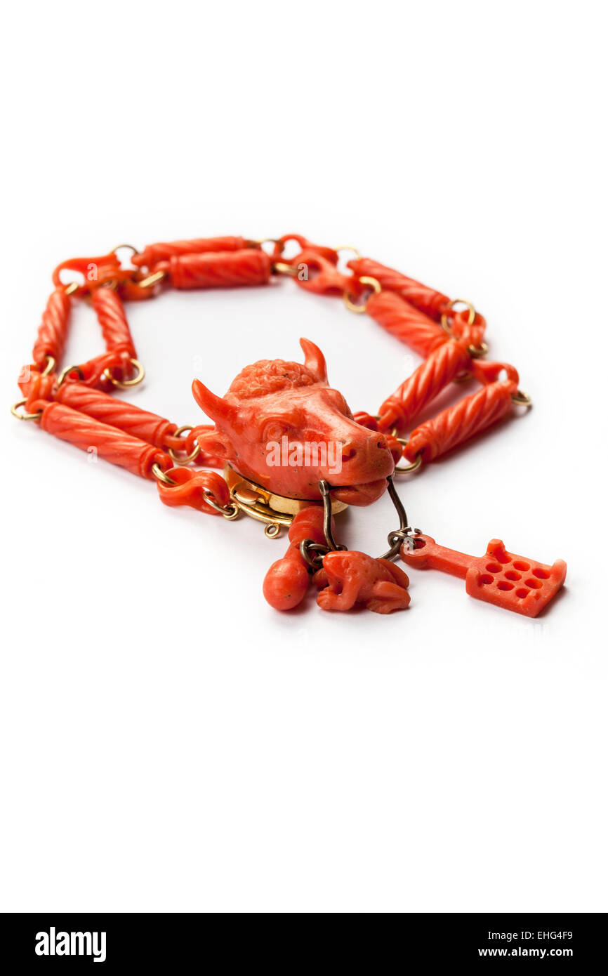Antique carved bull's head coral bracelet jewellery. Stock Photo