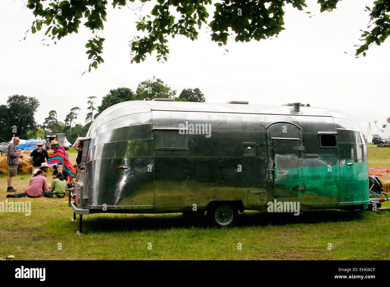 Iconic Airstream 'silver bullet' travel trailers at a festival in England. Stock Photo