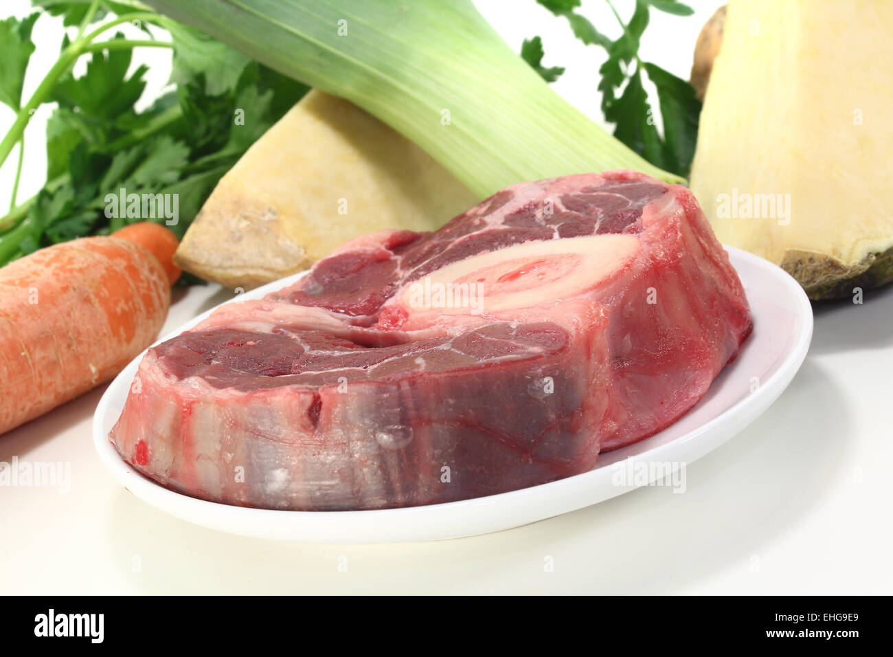 raw leg slice with soup vegetables Stock Photo