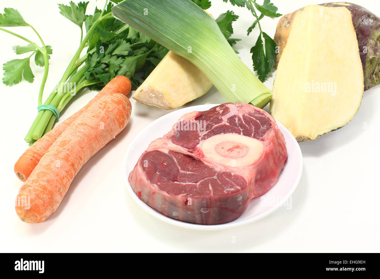 fresh raw leg slice with soup vegetables Stock Photo