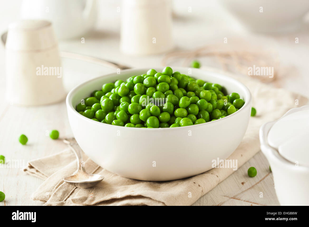 Organic Steamed Fresh Green Peas in a Bowl Stock Photo