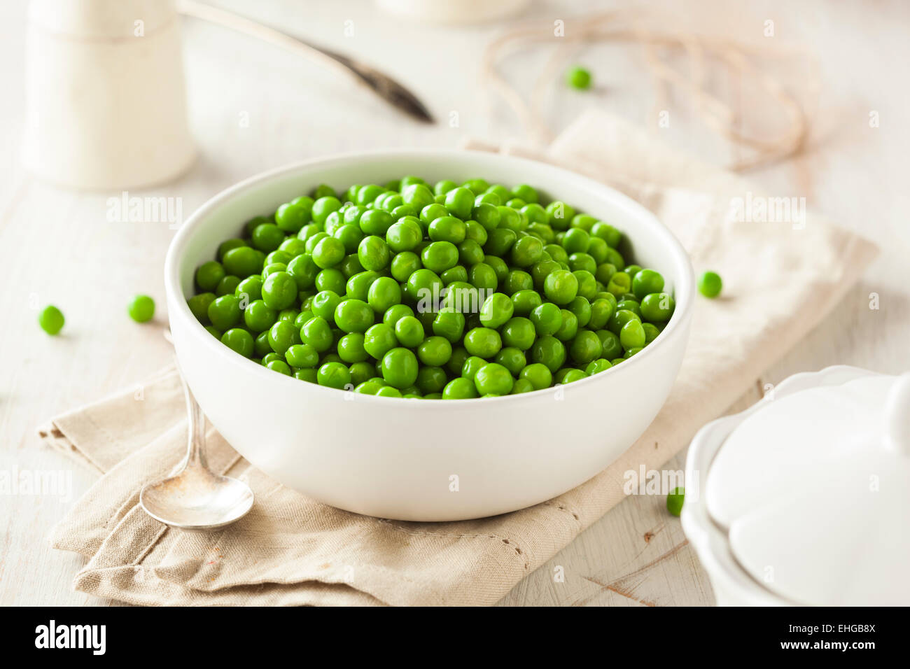 Organic Steamed Fresh Green Peas in a Bowl Stock Photo