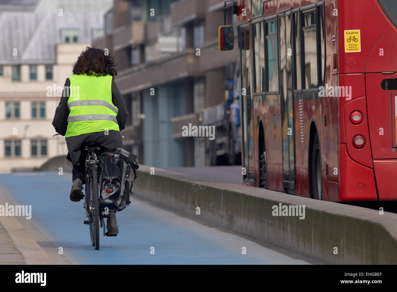 Cyclist on the Cycle Superhighway crossing Southwark Bridge, London,UK. Stock Photo