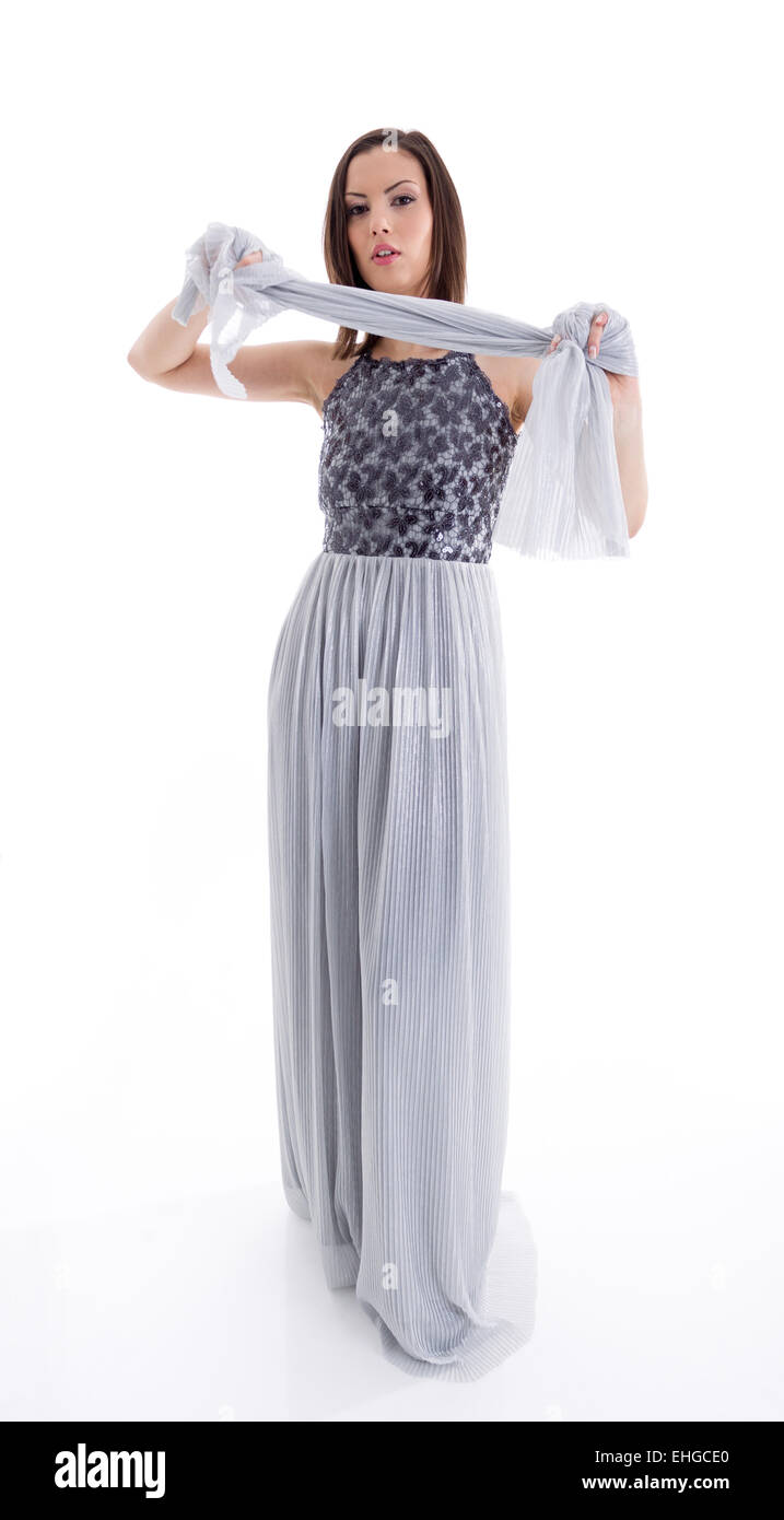 Beautiful woman in a gray dress posing for a photo shoot Stock Photo ...