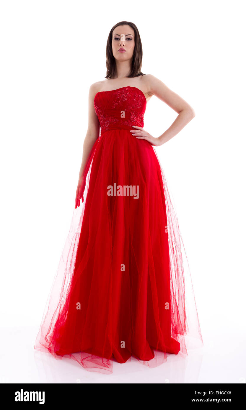 Beautiful woman in a red dress posing for a photo shoot Stock Photo - Alamy