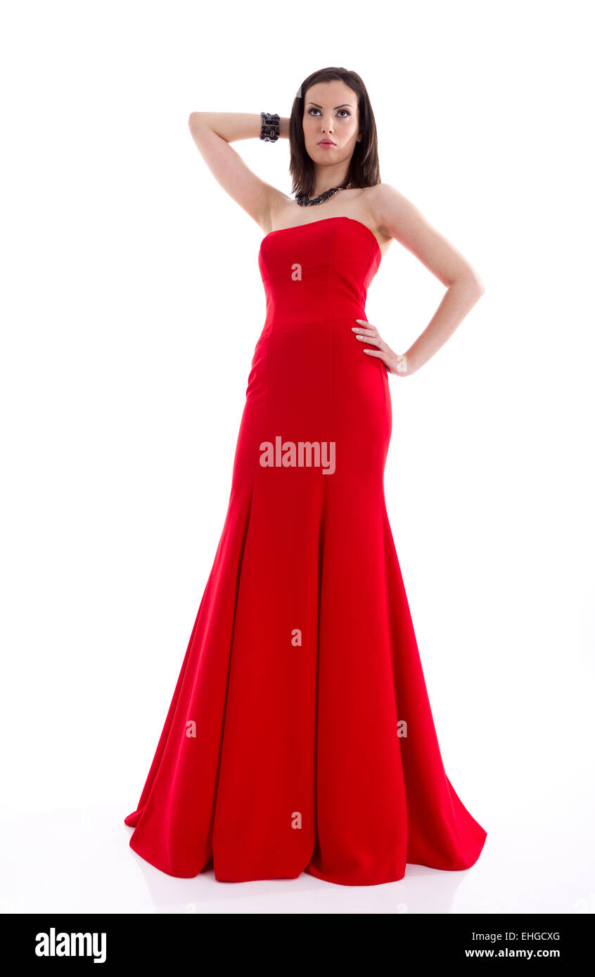 Beautiful woman in a red dress posing for a photo shoot Stock Photo - Alamy
