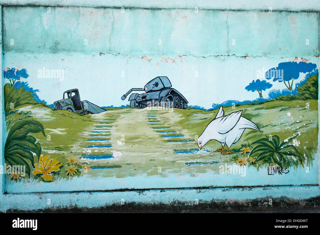 Cuba Santa Clara series of political extreme anti US USA North American cartoon cartoons murals on walls broken tank truck dove Stock Photo