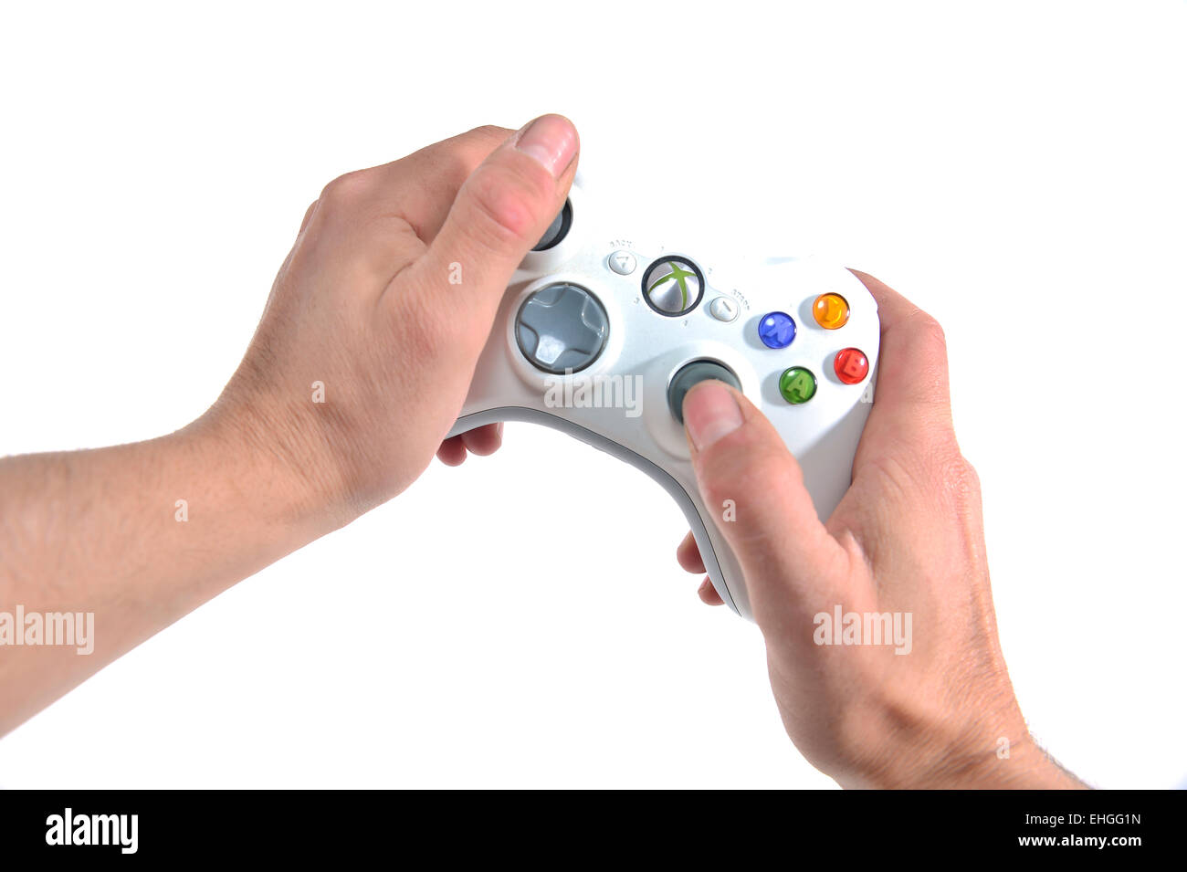 first person view of a person playing with an xbox 360 Microsoft controller Stock Photo