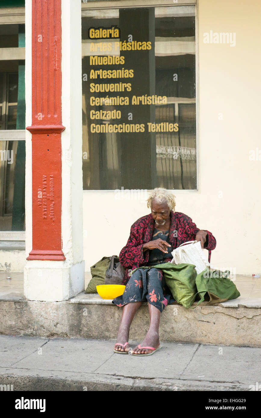 Cuba Santa Clara Elderly Old Bag Man Tramp Sitting On Steps Of