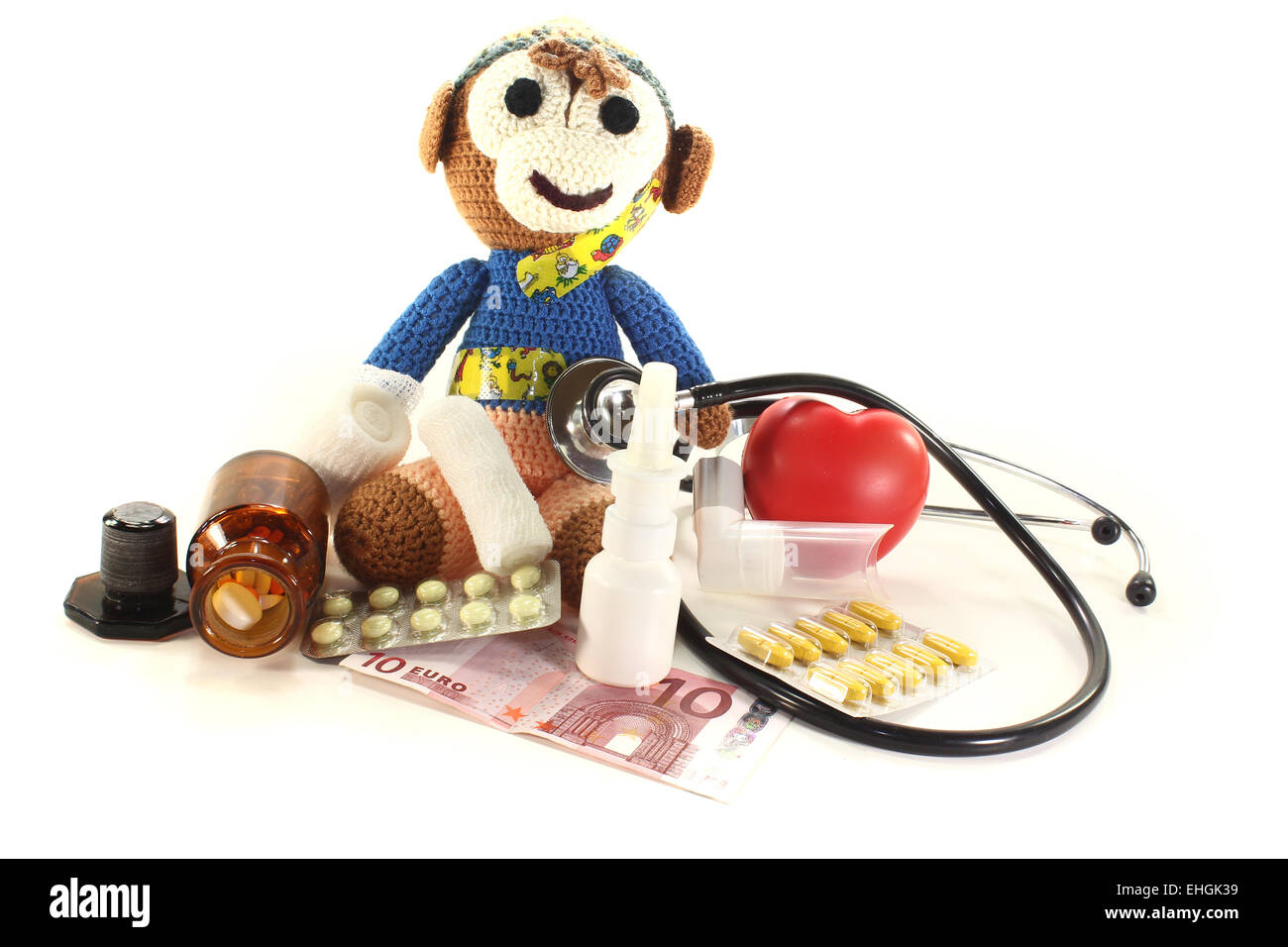 Pediatrician with monkey and money Stock Photo